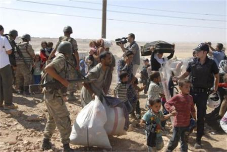 Daesh estrangula Ayn Arab y Turquía pide zona neutral