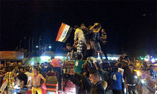 El pueblo iraquí festeja la liberación de Mosul