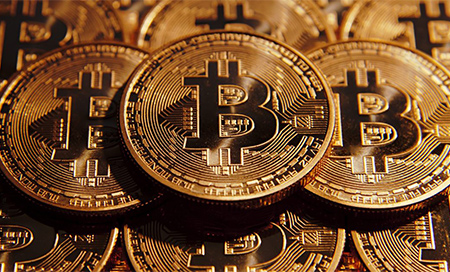 El bitcoin cae por debajo de los 6.000 dólares 